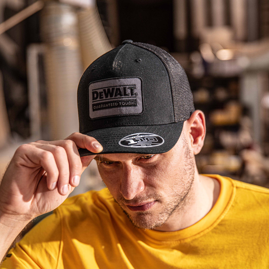 DEWALT Oakdale Trucker Hat, Black Patch with Black Mesh Model Wide View