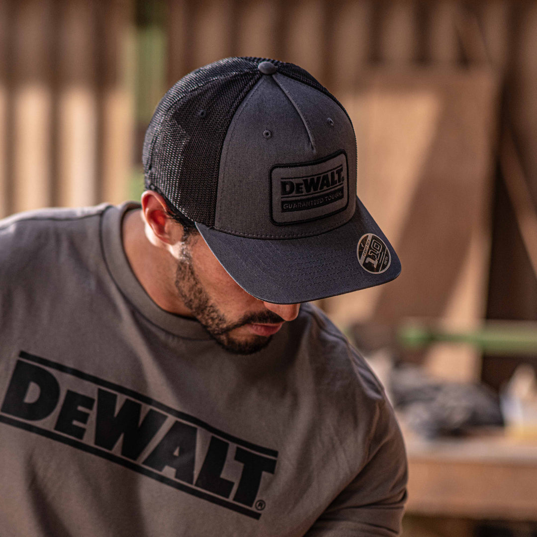 DEWALT Oakdale Trucker Hat, Grey Patch with Black Mesh Model 3/4 View